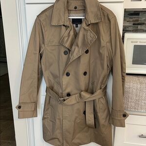 Men’s belted trench coat with removable Primaloft quilted liner.
